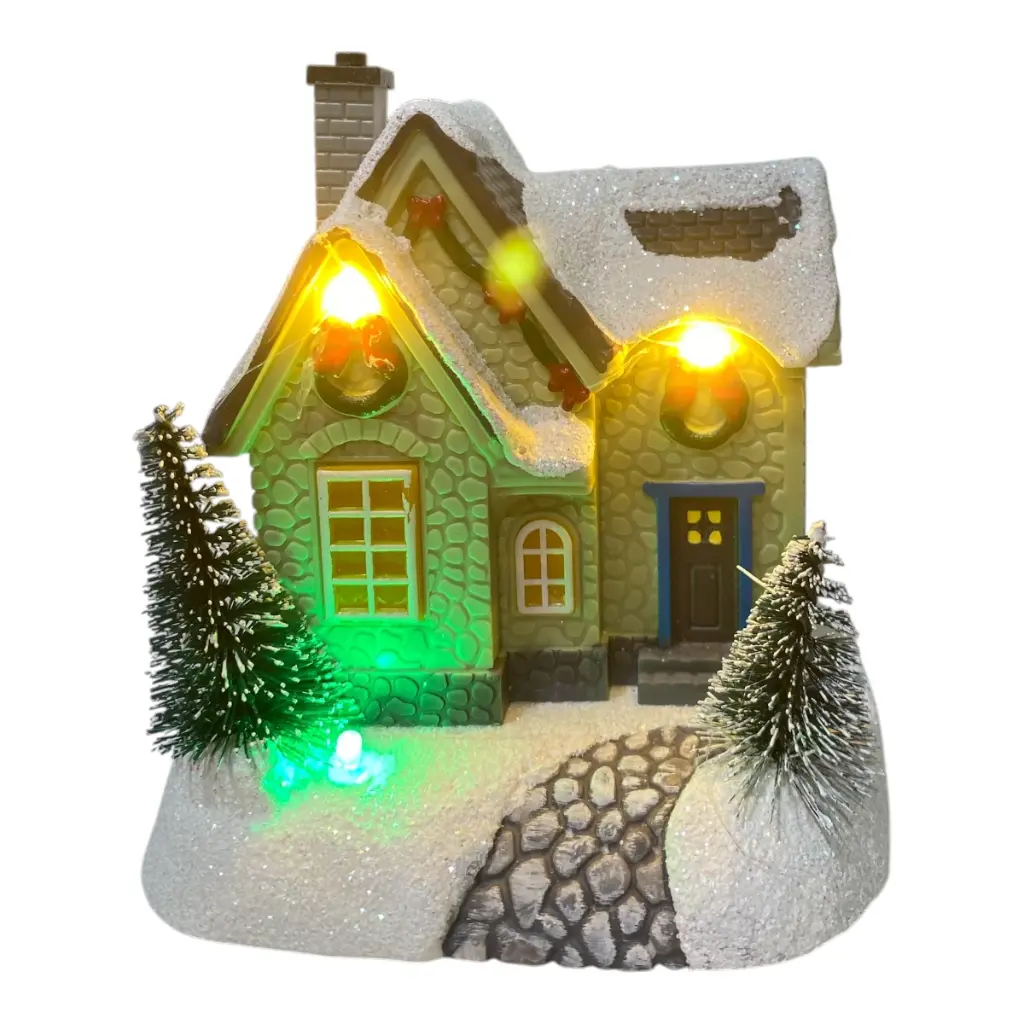 CASA NAVIDEÑA PVC CON LUZ LED A PILAS 10X8X12CM