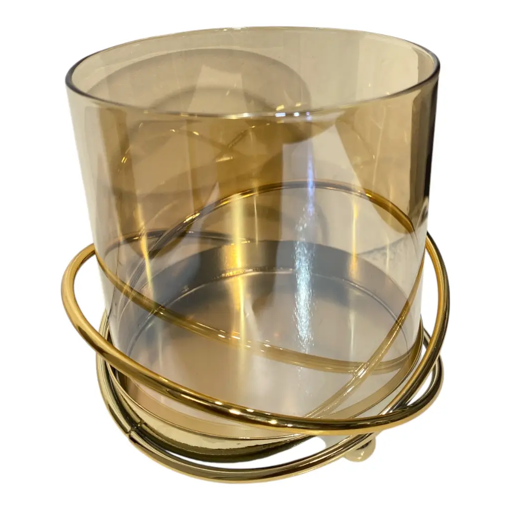 CANDELABRO DE VIDRIO AMBAR CON BASE DE HIERRO DORADA 11X12CM